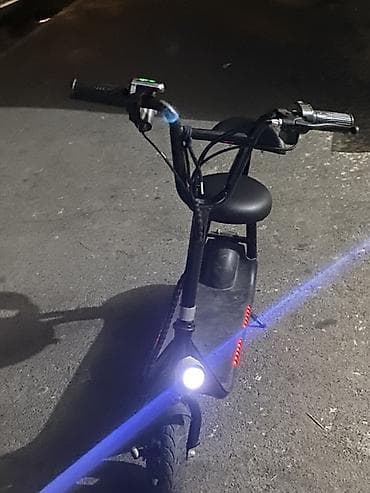 Oturacaqlı elektrik skuter -saatda 20 km surerle hereket edir — 2