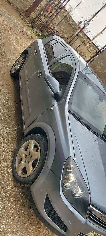 chevrolet aveo 2014: Opel Astra: 1.3 l | 2007 il 174000 km Hetçbek — 4