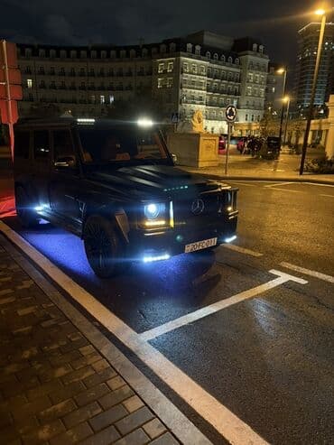 mersedes qapi: Mat qara rəngdə Mercedes-Benz G-Class AMG, qara fərdi çoxmillətli — 9
