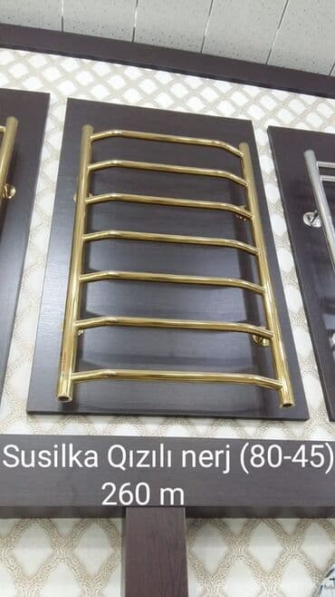 hamam quruducu: Qızılı rəngdə paslanmayan poladdan hazırlanmış dəsmal qurutma qurğusu — 1