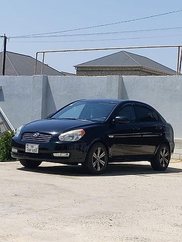 multi sukan: Hyundai Accent: 1.4 l | 2008 il Sedan — 8