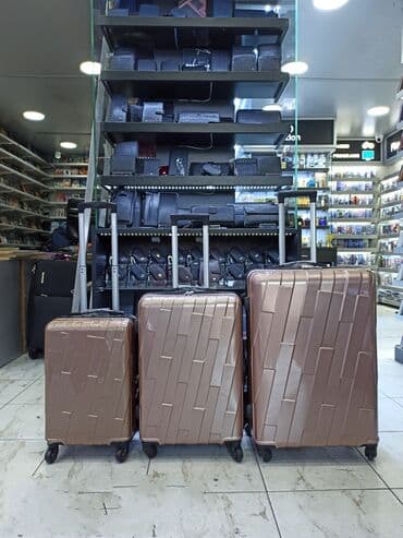 yol cantası: Material polikarbonat.S-50azn. M-80azn. L-110azn Camadan — 1