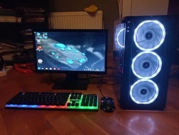 kompyuter hisseleri: Qabaqda üç ədəd mavi işıqlı ventilyatoru olan qara rəngli kompüter — 6