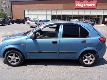 şlanqların satışı: Mavi rəngdə Saipa Tiba avtomobili. Avtomobilin arxa hissəsində "Saipa" — 3