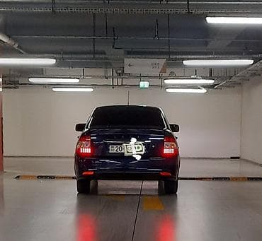 byd disk teker: LADA Priora xetcbek – tünd mavi rəng, tam qapalı salonlu. Xarici — 3