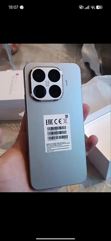 iphone 14 islenmis: Xiaomi 15 Ultra, 512 GB, rəng - Boz, 
 Zəmanət, Barmaq izi, Simsiz şarj — 1