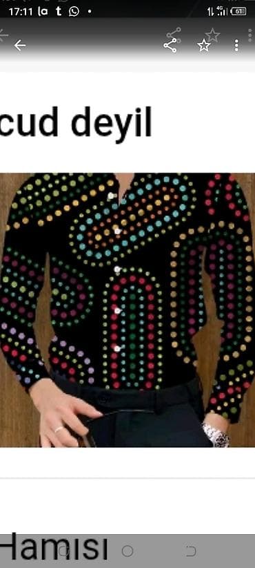 Kişi köynəyi – uzunqol, düyməli model. Parlaq çoxrəngli xırda