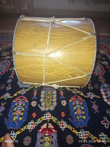 Nagara az işlənib səsi normaldı iki üzləridə ağ rəngidi birində — 2