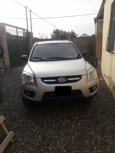 e 124: Kia Sportage – gümüşü rəngdə kompakt krossover/SUV Xüsusiyyətlər: - — 1