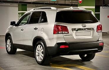07 disk: Kia Sorento: 2 l | 2009 il Krossover — 7