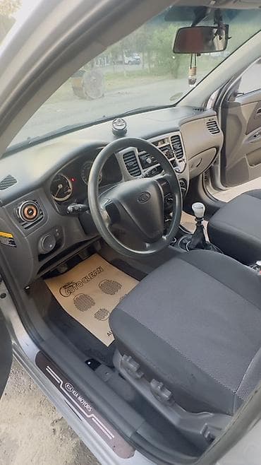 авто volkswagen: Kia Rio: 1.4 л | 2005 г. Хэтчбэк — 6