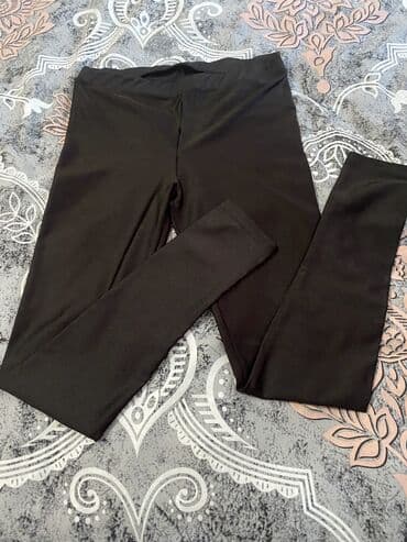 Digər kişi geyimləri: Klassik mavi rəngdə dar kəsimli cins şalvar. - Model: 5 ciblə – 2 ön — 2