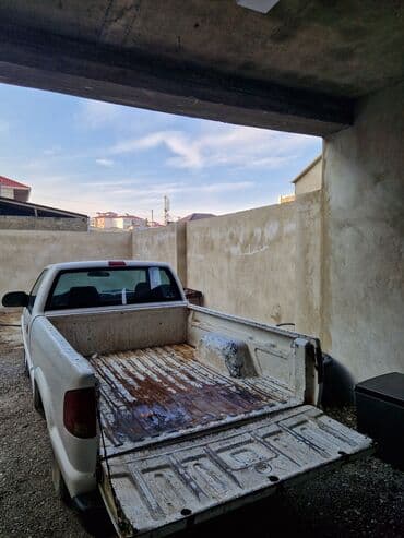 masin lada: Chevrolet S-10 pikap, ağ rəng. - Kuzov: tək kabina, uzun yük bölməsi — 7