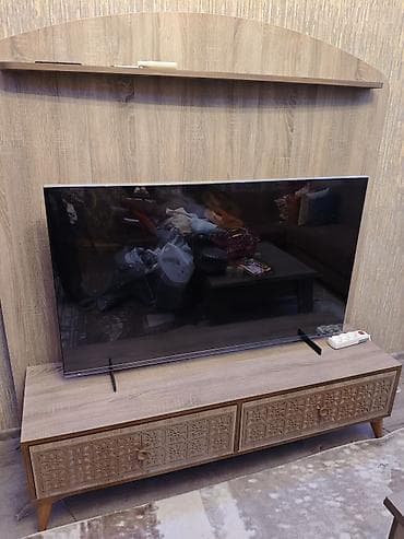 divarda kitab refi: TV stend, Azərbaycan — 1