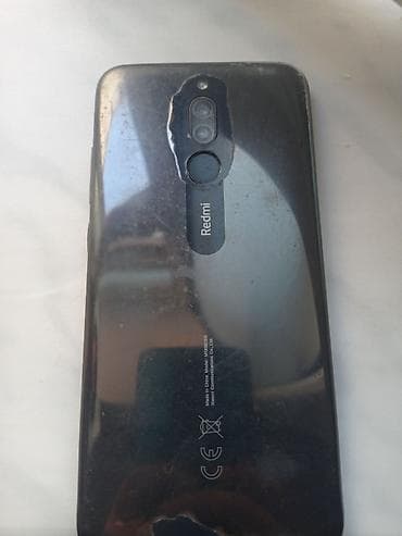 Xiaomi Redmi (arxa qapaqda “Redmi” loqolu model). Xüsusiyyətlər: -