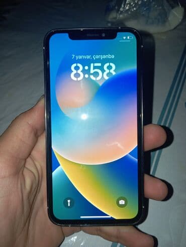 Tata: IPhone X, 64 GB, Qara — 2