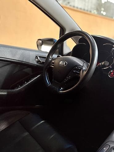 Kia Cerato: 2 l | 2013 il Sedan — 9