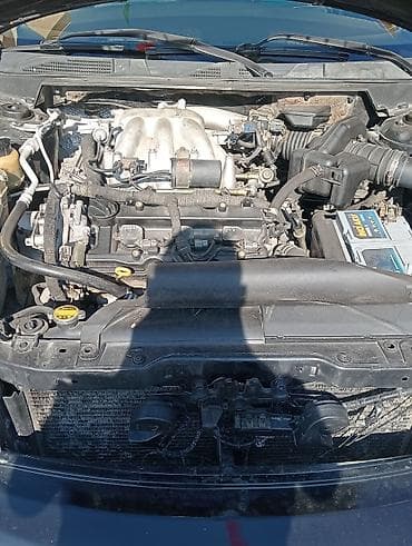 man sat: Nissan Teana – qara rəngli, geniş və komfortlu sedan. Xüsusiyyətlər — 9