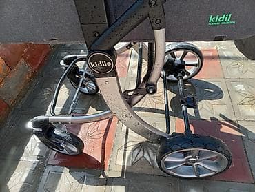 islenmis kalyaskalar: Çıxarıla bilən beşikli araba, Kidilo, Yaş: <1 ay — 5