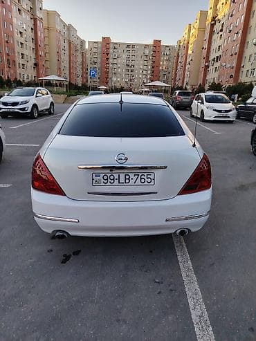 tesla model 3: Nissan Teana: 2.3 l | 2005 il Sedan — 3