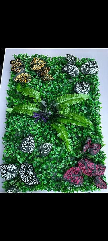 dekor daş: Müxtəlif süni bitkilərdən ibarət dekorativ divar paneli. Bu panellər — 1