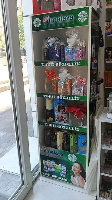 xonca satisi: Vitrinlər-5 əd., polkalar 7 sıra şkaflar, pufikler, divar — 7