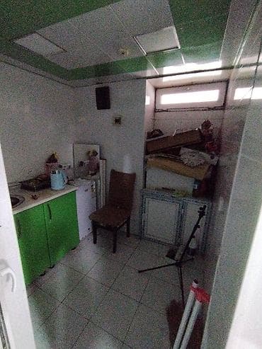 Daşınmaz əmlak: Əhmədli qəsəbəsi Qaçaq Nəbi küçəsi 1 ünvanında yerləşən 5 mərtəbəli — 9