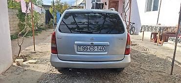 qosqu satilir: Opel Astra: 1.6 l | 1999 il 232000 km Universal — 2