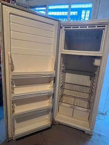 Qabyuyan maşınlar: Ağ rəngdə təkqapılı soyuducu. Bu kompakt ölçülü soyuducu mətbəx, ofis — 5