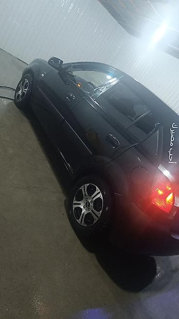 ucuz 011: Kia Rio: 1.5 l | 2006 il Hetçbek — 5