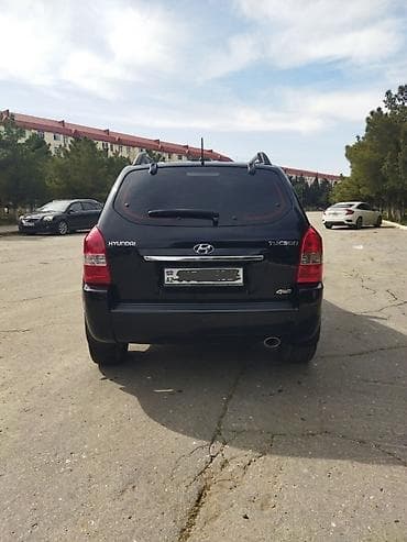 cros moto: Hyundai Tucson: 2 l | 2008 il Ofrouder/SUV — 2