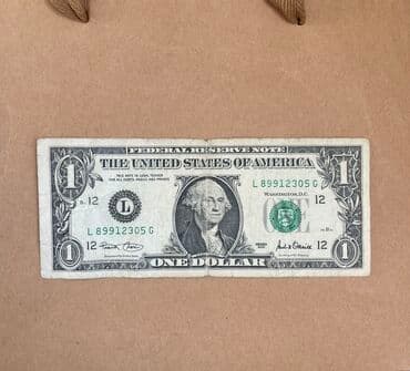 750 qizilin qiyməti 2020: Dollar 2001 — 1