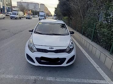 Kia Rio: 1.4 l | 2014 il Hetçbek