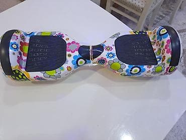 ninebot e2 pro: Elektrik hoverboard/skuter - Rəngarəng, çiçək printli korpus dizaynı — 1