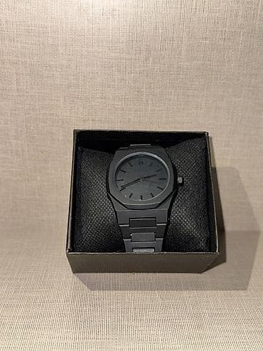 Qara rəngli kişi saatı - Minimalist dizayn: mat qara siferblat