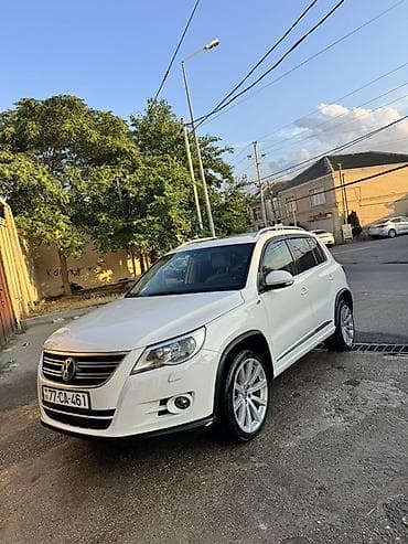 sam diskiler: Volkswagen Tiguan: 2 l | 2011 il Krossover — 2