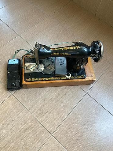 et masini: Elektrik tikiş maşını - Korpusu klassik qara rəngdə, üzərində qızılı — 1