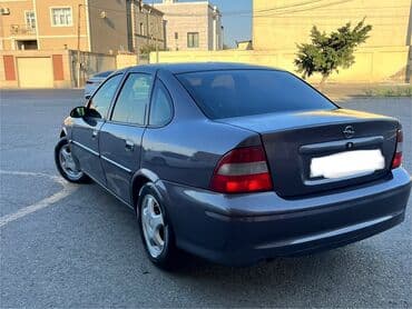 садор диски: Tünd boz rəngdə "Opel Vectra" modeli, sedan tipli avtomobil — 5