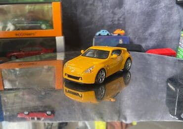 metbex tavan modelleri: Коллекционная модель Nissan 370Z Z34 yellow 2008 DeAgostini Scale — 1