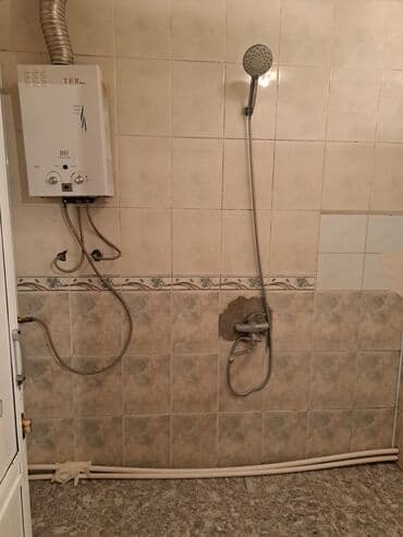 koroğluda kiraye ev: Bakixanov qəsəbəsi(Razin),Razin talkuçkasın yanında olan,2/11 — 9