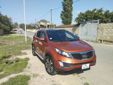 qadın üçün maşınlar: Kia Sportage: 2 l | 2011 il Ofrouder/SUV — 8