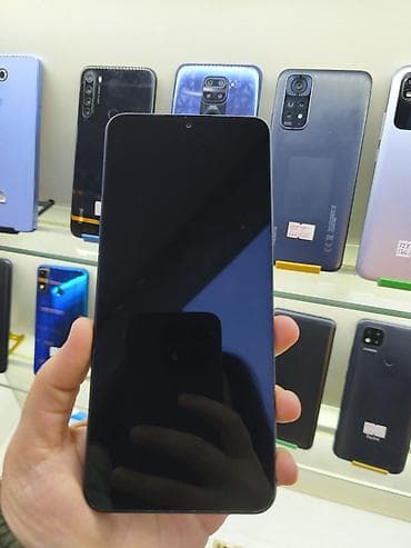 telefon qelemi: Redmi smartfon Xüsusiyyətlər: - Arxa kamera sistemi: dairəvi modul — 2