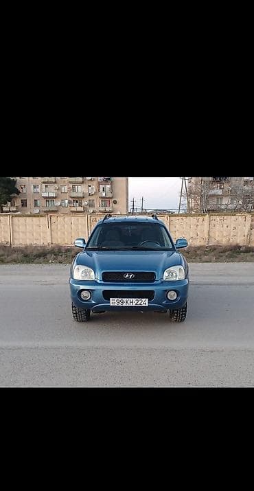 ij disklər: Hyundai Santa Fe – mavi rəngli, 5 qapılı SUV. Texniki və dizayn — 1