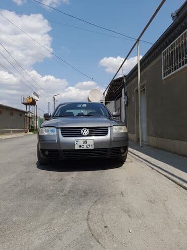 Çaydanlar: Gümüşü rəngdə olan Volkswagen Passat avtomobili. Təkərləri yaxşı — 1