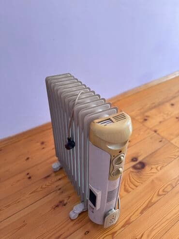тепловентилятор купить в баку: Portativ elektrikli yağlı radiator, effektiv və rahat istilik təmin — 4