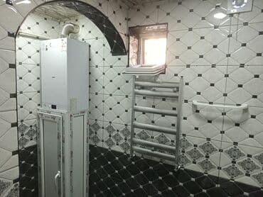 huseynbala eliyev: Merdekanda tam merkezde, 40 kv, keyfiyyetli temirli, kombi, isti pol — 6