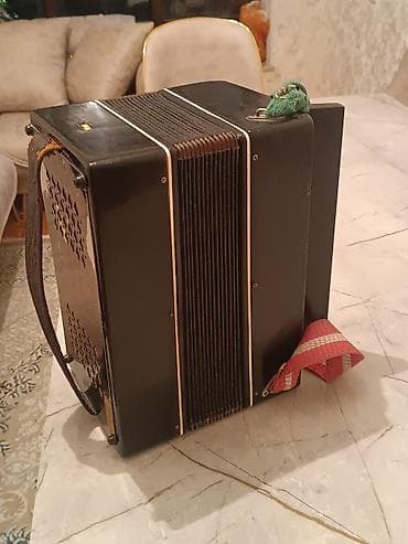 Qarmon, Akustik, İşlənmiş