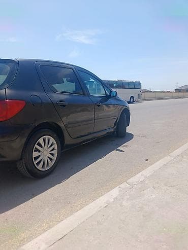 prius duman: Peugeot 307, qara rəng, hetçbek kuzov. Texniki və dizayn — 3
