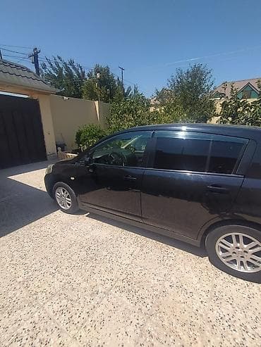 Avtomobil satışı: Nissan Tiida hatchback - Kuzov: 5 qapılı hatchback, qara rəng - — 5