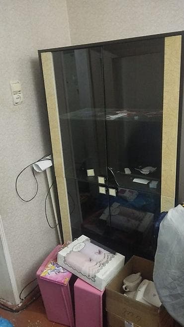 Şüşəli dolab vitrini, İşlənmiş, Ünvandan götürmə